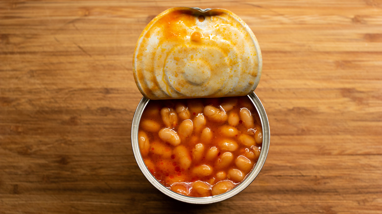 can of baked beans with the lid peeled back