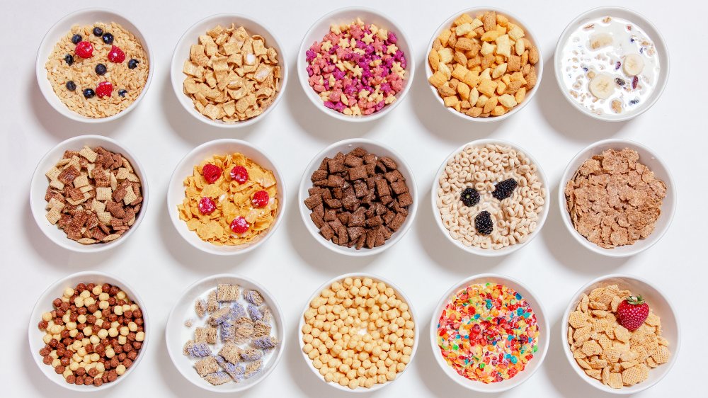 bowls with different kinds of breakfast cereals