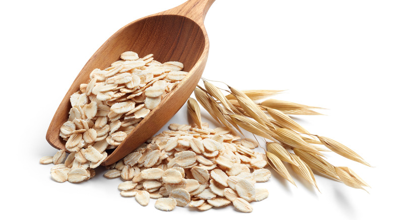 Scoop of raw oatmeal