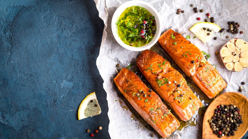 Salmon with garlic, lemon and peppercorn, salsa verde