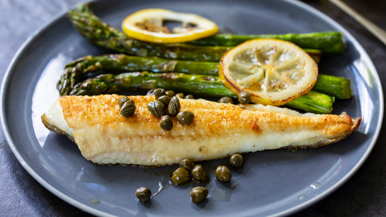 Capers on a piece of fish