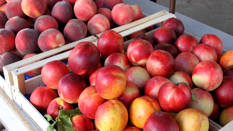 Nectarines in a wooden crate