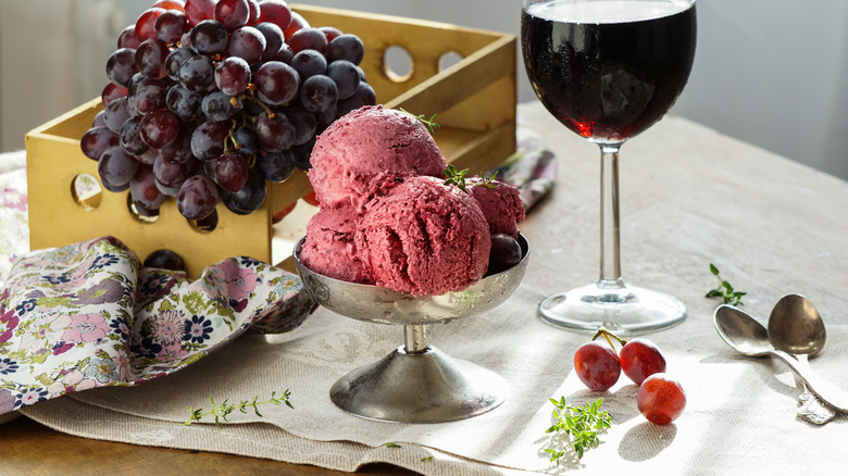 Glass of red wine and bowl of ice cream