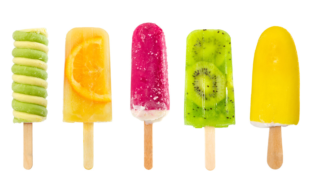 A set of different fruit ice cream popsicles.