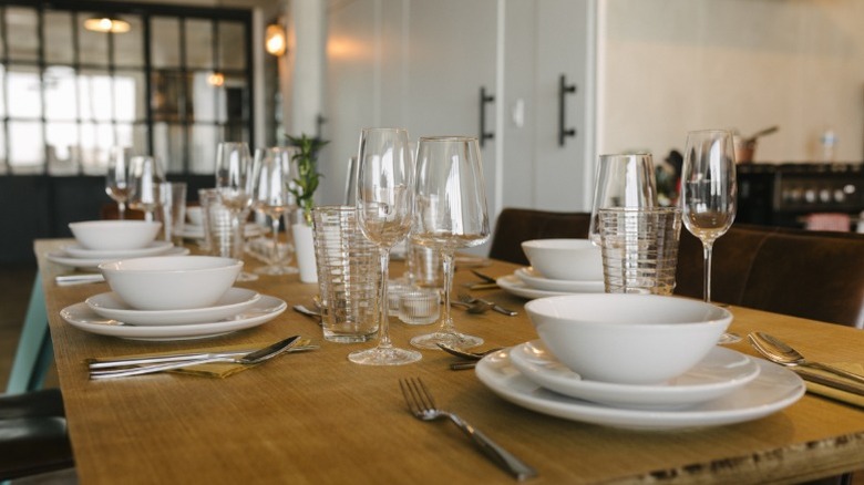 Table set with plates and glasses for a party