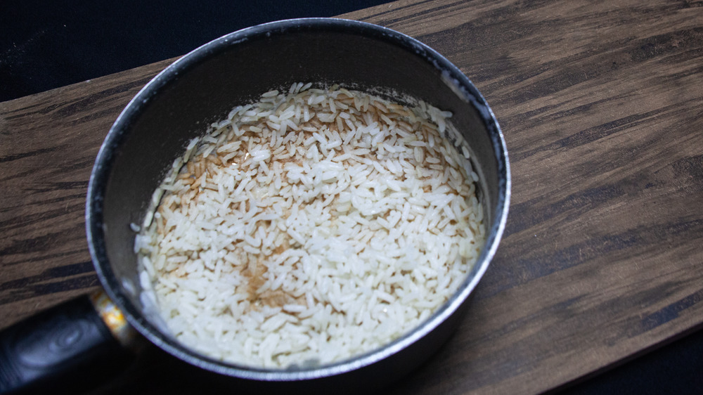 Overcooked rice in a pan