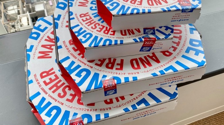 Pizza boxes from Domino's Japan