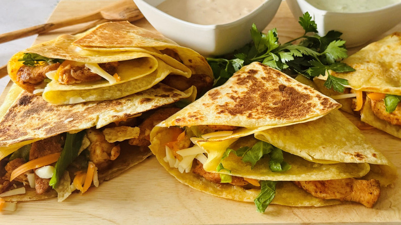 Taco Bell chipotle ranch chicken stackers on wooden board