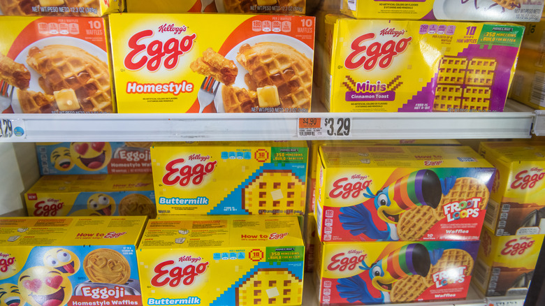 boxes of Eggo waffles on freezer shelves at a grocery store