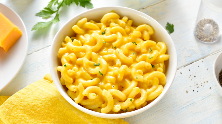 bowl of mac and cheese on rustic white table