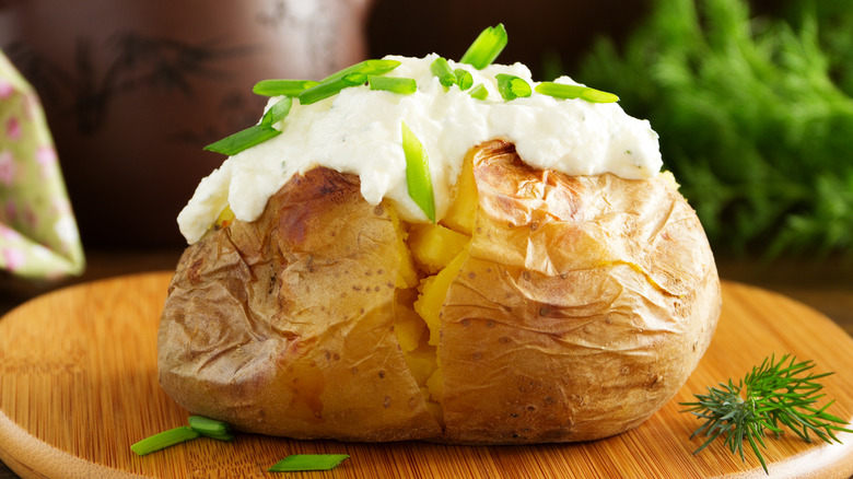 Baked potato with garnish