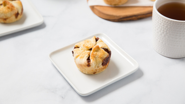 apple croissants served on table