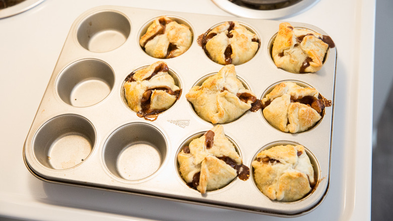 baked apple croissants in muffin tin