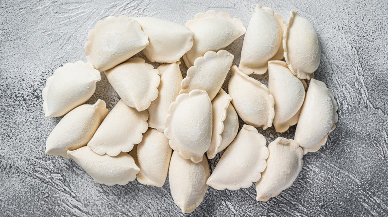 frozen pierogi lying on countertop