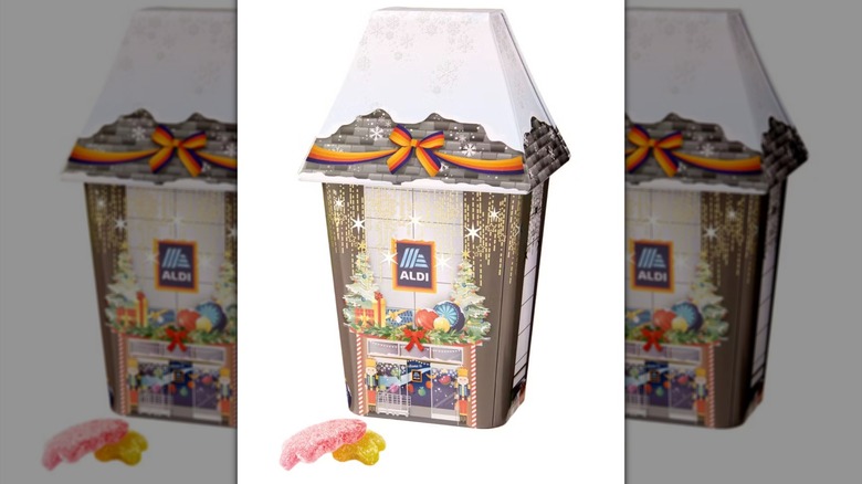 House-shaped tin container filled with candy