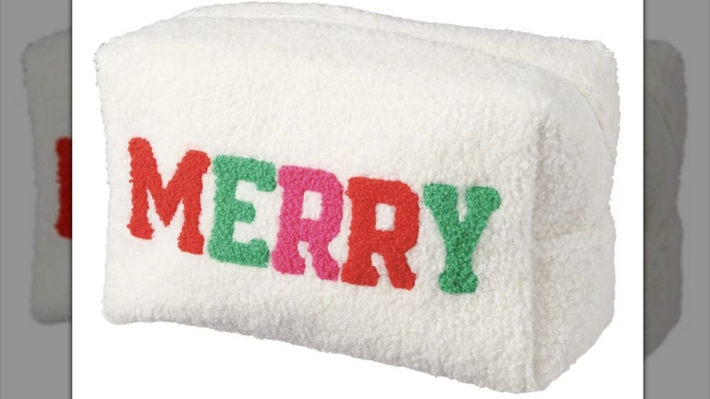 Small fuzzy pouch with "merry" on the front