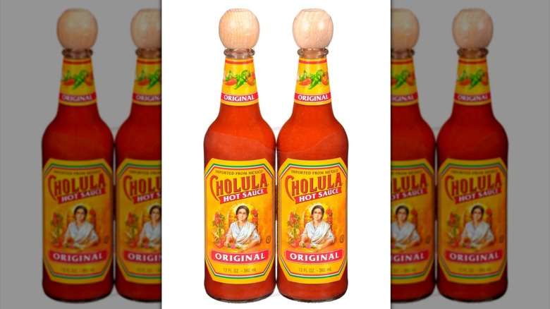 Two bottles of Cholula hot sauce