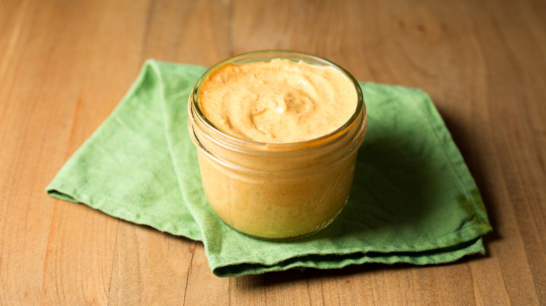 orange creamy sauce in jar