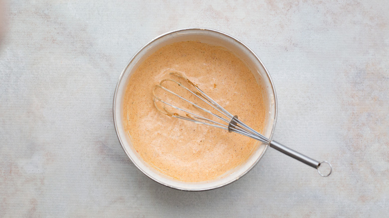 orange creamy sauce in bowl