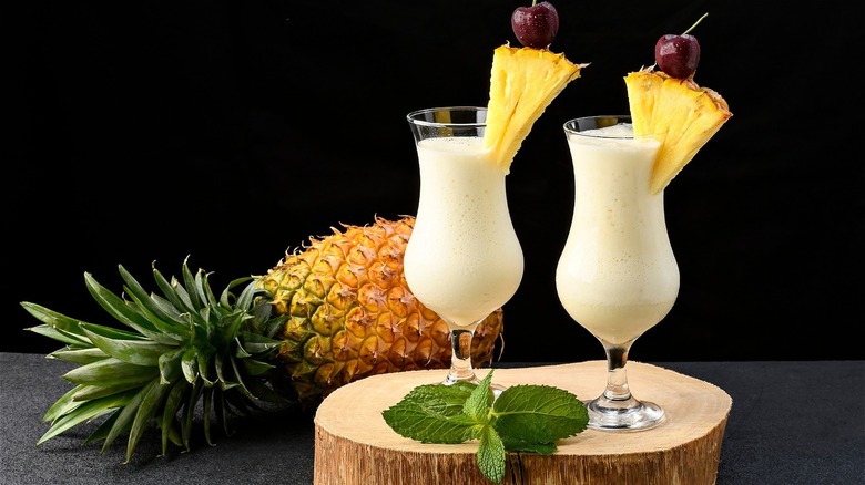 piña coladas with pineapple garnish