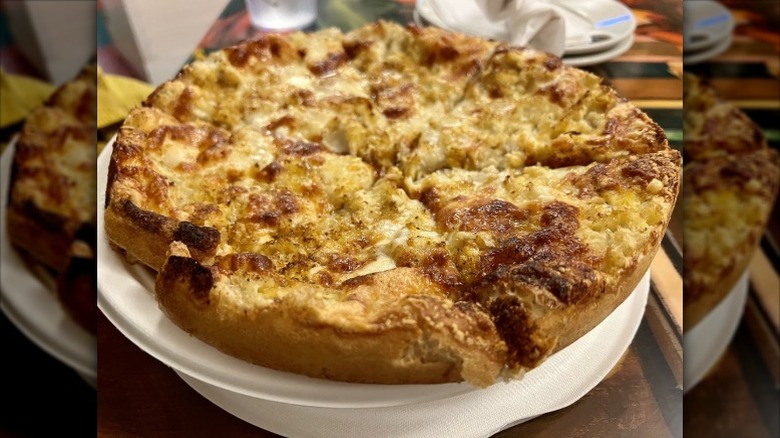 a thick Matthew's pizza with signature crust