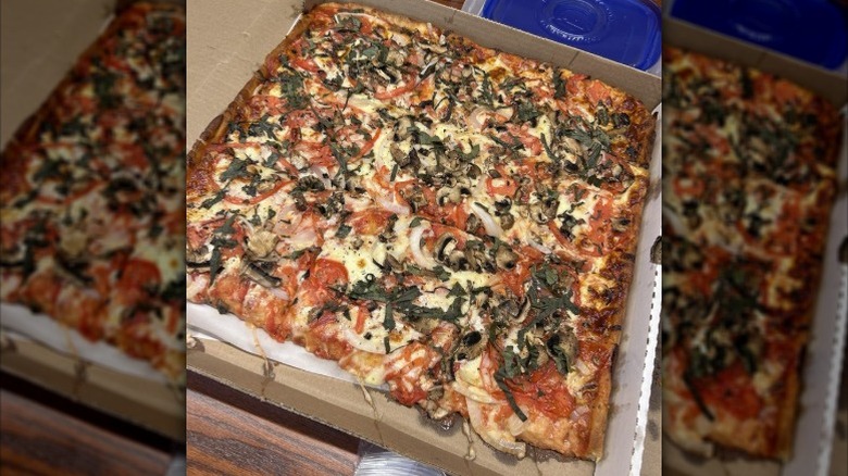 Sicilian Pizza from Pinocchio's Pizza & Subs with mushrooms, onions, and tomato