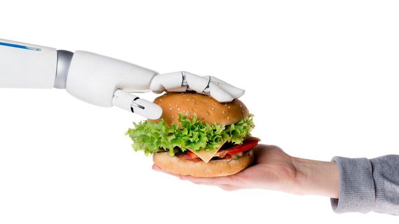 Robot serving a sandwhich