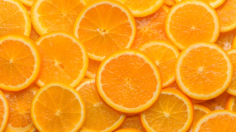 A bunch of orange slices layered on top of each other