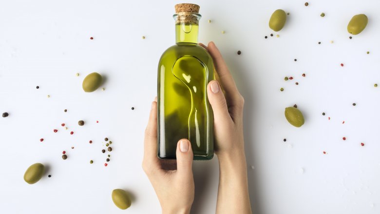 Should olive oil be added to a hot or cold pan?