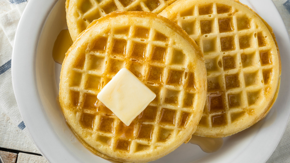 waffles on a plate with butter