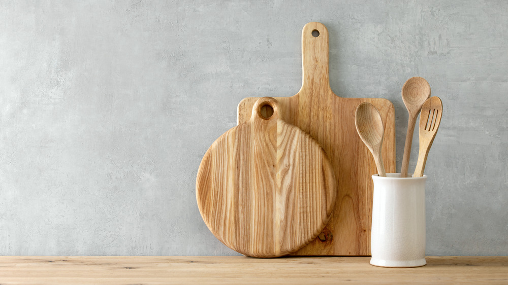 Wooden cutting boards on kitchen counter