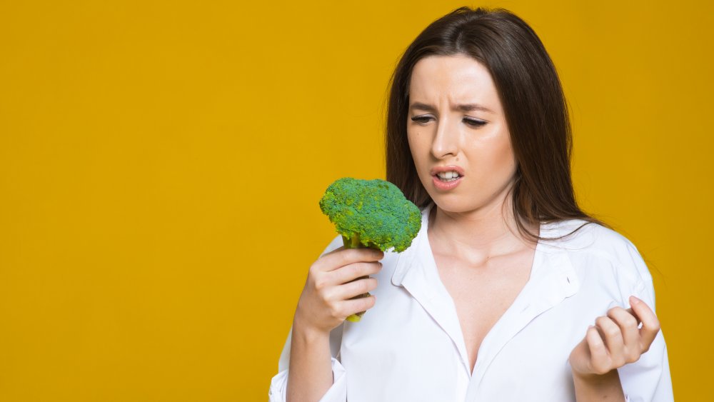 woman confused about broccoli