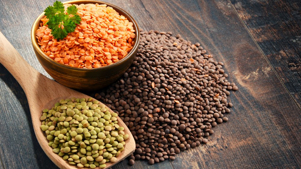 Green, red, and brown dried lentils