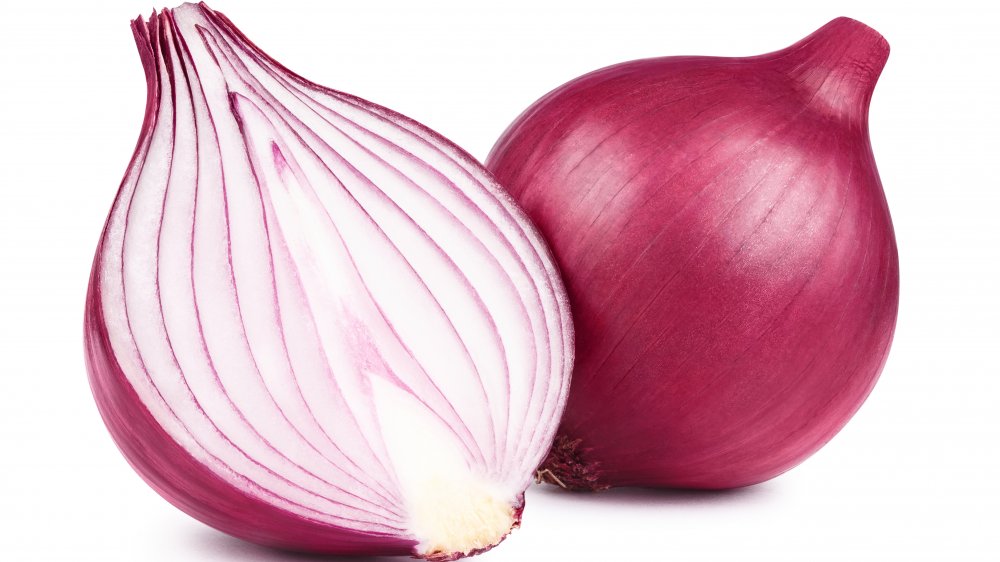 Red onions whole and sliced in half