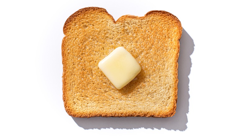 piece of butter on toast