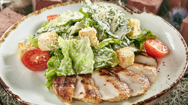 Plate of chicken caesar salad