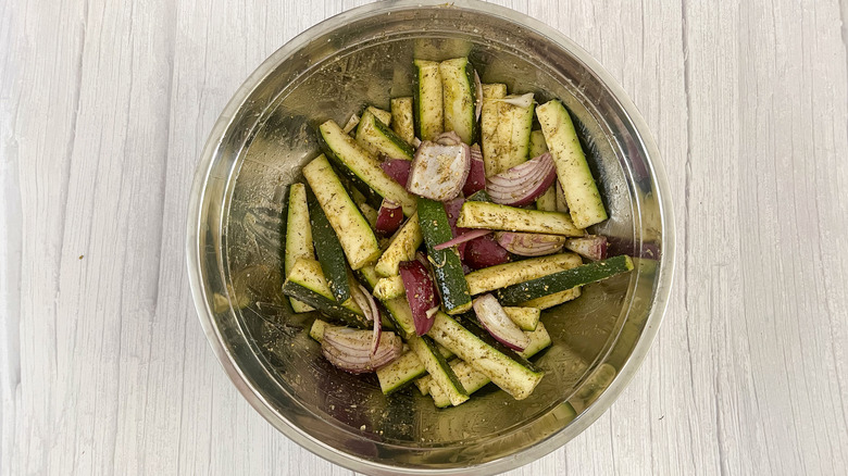 zucchini and onion in bowl