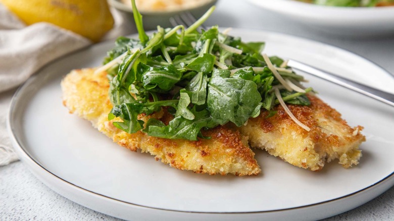 fried fish with salad